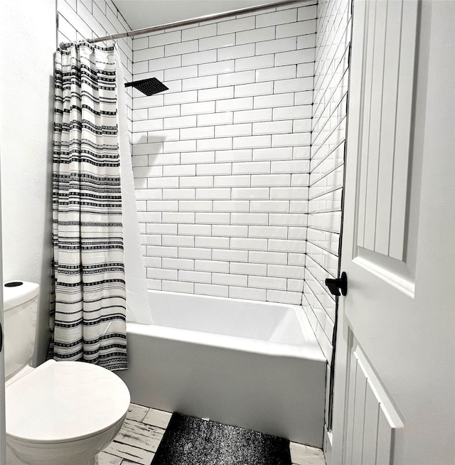 bathroom with tile patterned flooring, toilet, and shower / tub combo with curtain