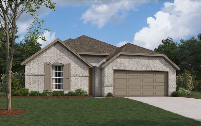 view of front of property with a front yard and a garage