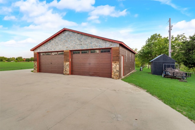 garage with a lawn