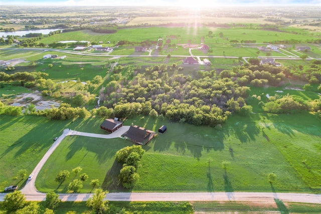 bird's eye view with a water view and a rural view