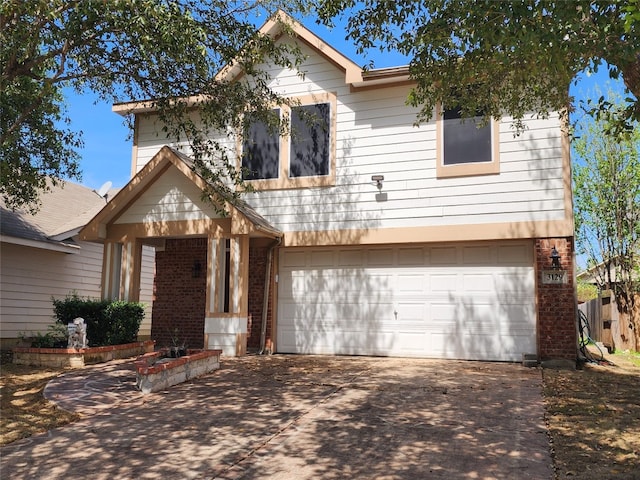 view of front of property with a garage