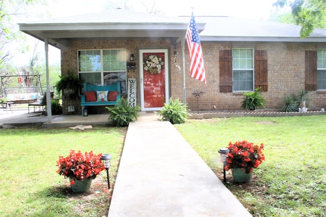 view of front of property with a front lawn