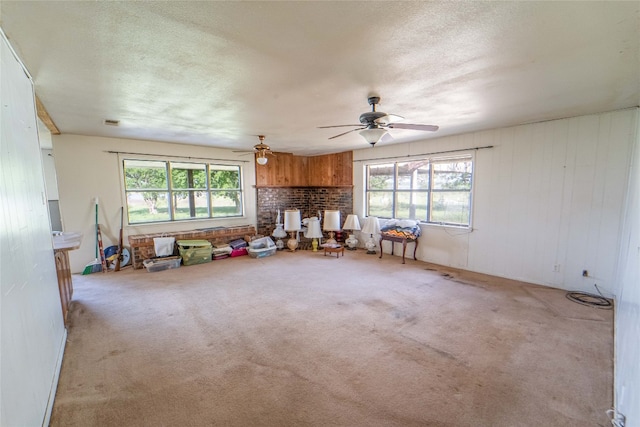 interior space featuring ceiling fan