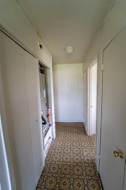 hallway with tile floors