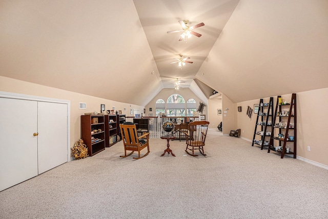 interior space featuring ceiling fan and vaulted ceiling