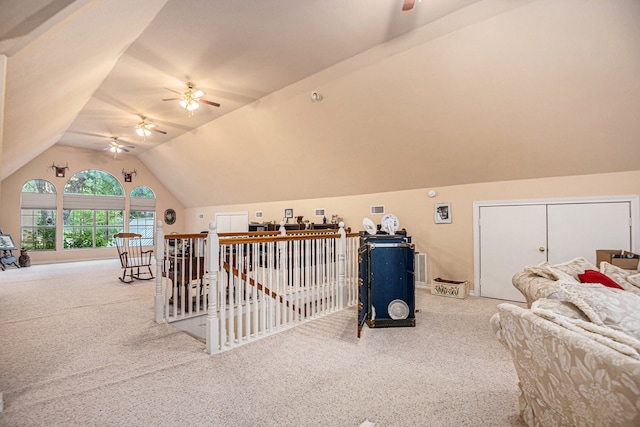 additional living space featuring ceiling fan, vaulted ceiling, and carpet floors