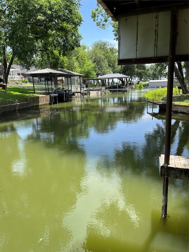 view of dock with a water view