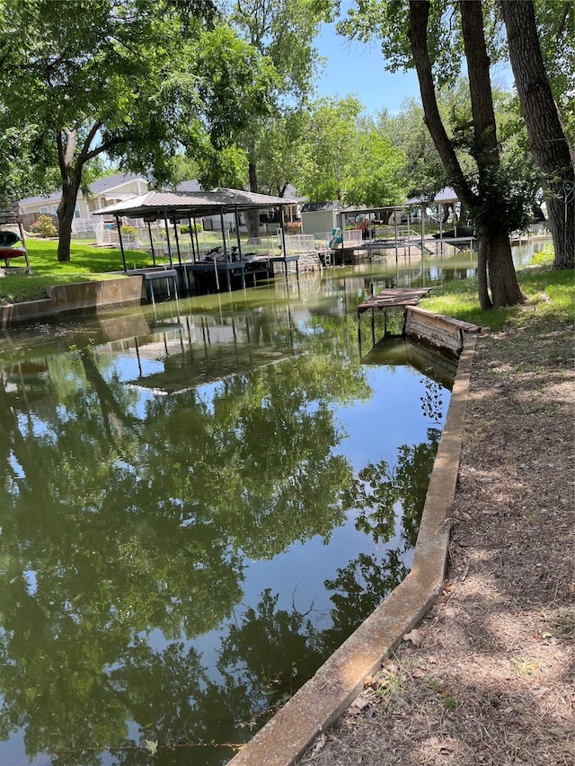 property view of water featuring a dock