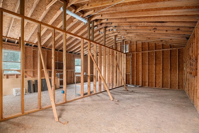 misc room with lofted ceiling