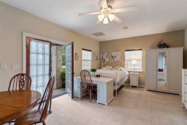 bedroom featuring ceiling fan, light tile patterned floors, and access to outside