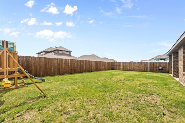 view of yard with a playground