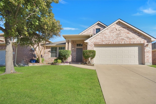 ranch-style home with an attached garage, driveway, a front yard, and brick siding