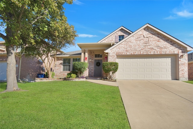 view of front facade featuring a garage and a front lawn