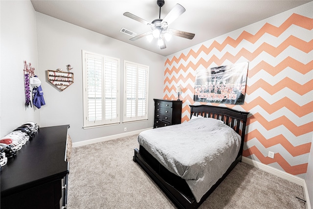 bedroom featuring ceiling fan and carpet flooring