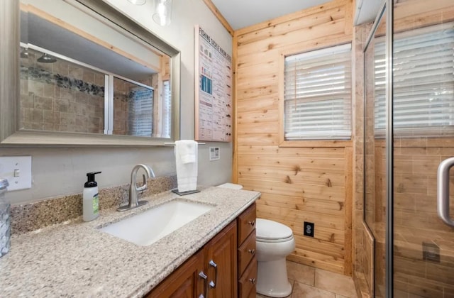 bathroom featuring walk in shower, toilet, tile flooring, vanity, and wooden walls