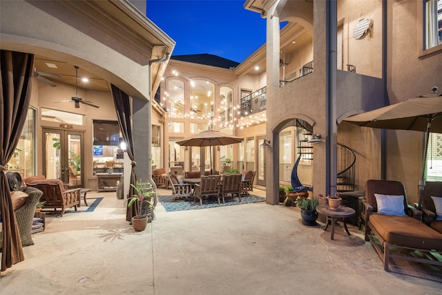 view of patio / terrace featuring french doors and ceiling fan