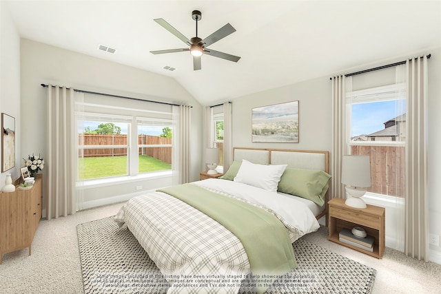 empty room featuring light colored carpet and ceiling fan