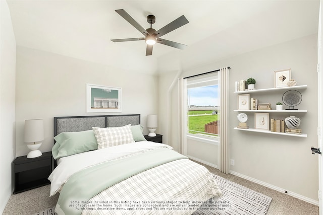 carpeted bedroom with ceiling fan