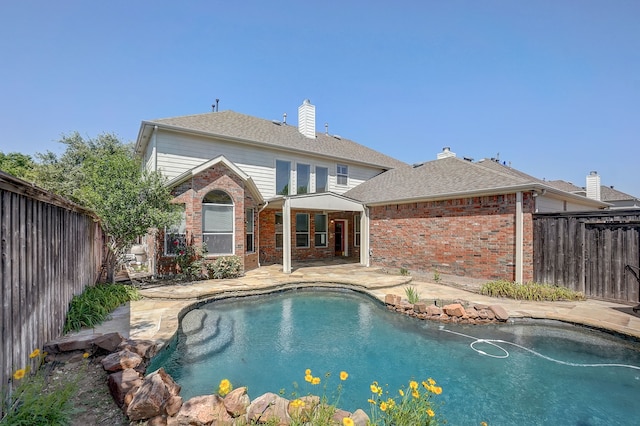 view of pool with a patio