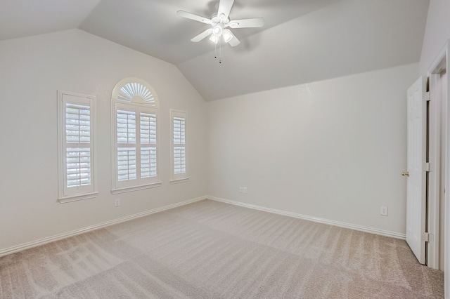 unfurnished bedroom featuring carpet flooring, ceiling fan, and lofted ceiling