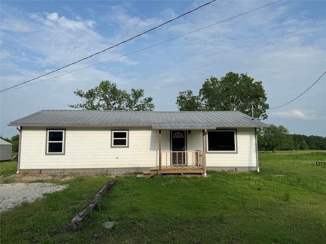 ranch-style house with a front lawn and a porch