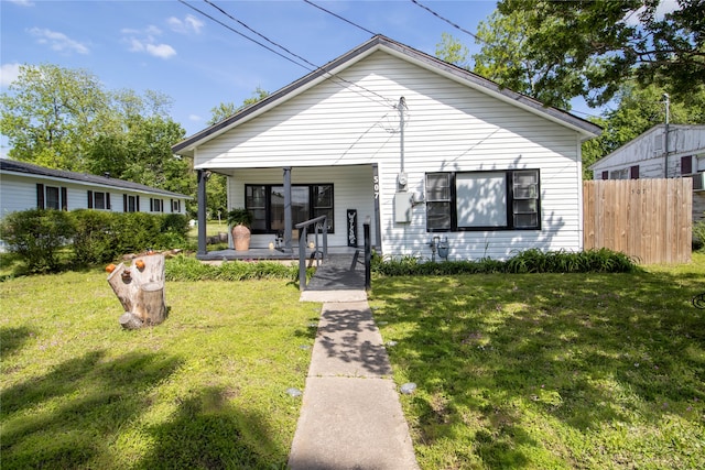 bungalow featuring a front yard