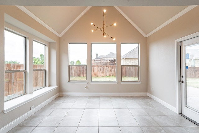 interior space featuring ornamental molding, a healthy amount of sunlight, and light tile flooring