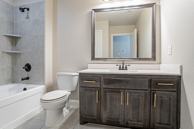 full bathroom with tiled shower / bath combo, tile flooring, vanity, and toilet