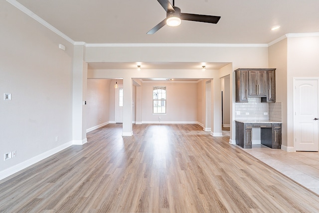 unfurnished living room featuring ceiling fan, light hardwood / wood-style floors, and ornamental molding