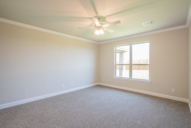 carpeted empty room with ceiling fan and ornamental molding