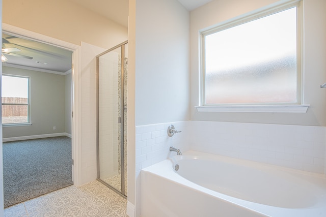 bathroom featuring tile floors, crown molding, plus walk in shower, and ceiling fan