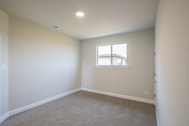 empty room featuring carpet floors