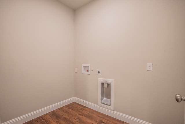 laundry area with hookup for a washing machine, hardwood / wood-style floors, and hookup for an electric dryer