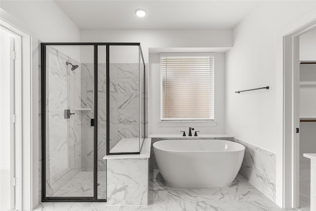 bathroom featuring tile floors and plus walk in shower