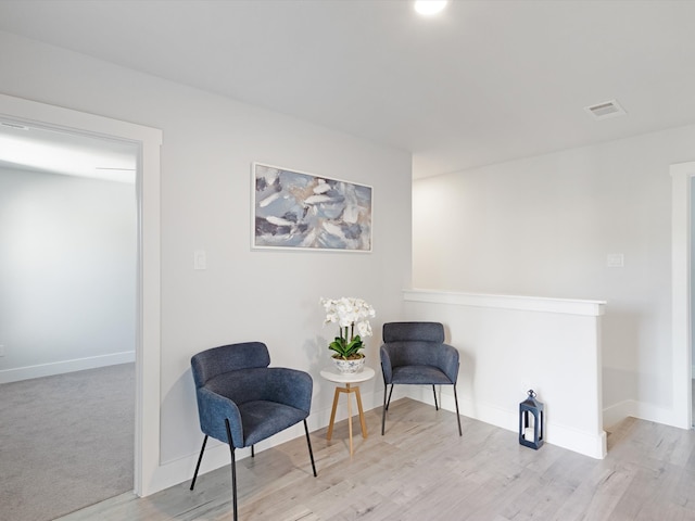 living area featuring light hardwood / wood-style floors