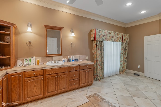 bathroom featuring dual vanity, ceiling fan, crown molding, and tile floors