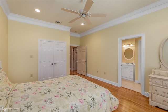 bedroom with crown molding, a closet, ceiling fan, and light tile floors