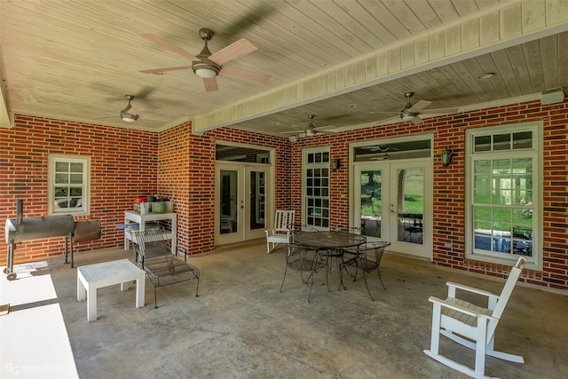 view of terrace with french doors and ceiling fan