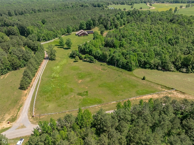 birds eye view of property featuring a rural view