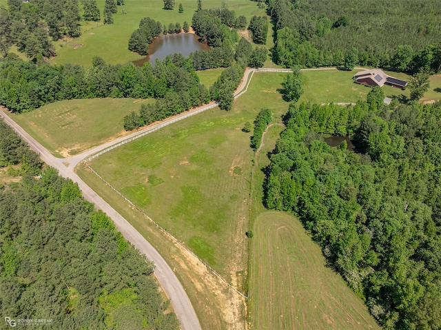 aerial view with a water view and a rural view