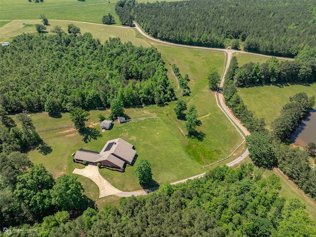 birds eye view of property with a rural view