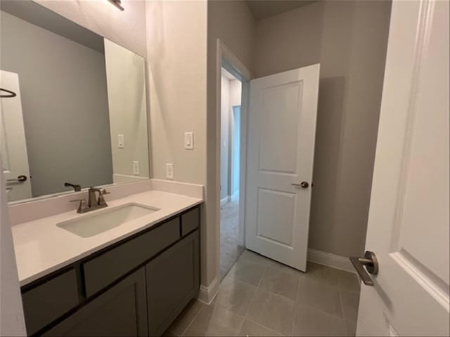 bathroom with vanity and tile patterned floors