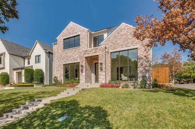 view of front of property with a front lawn