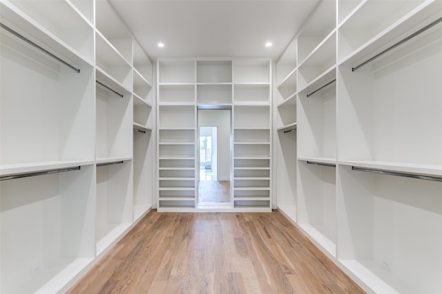 walk in closet featuring light wood-type flooring