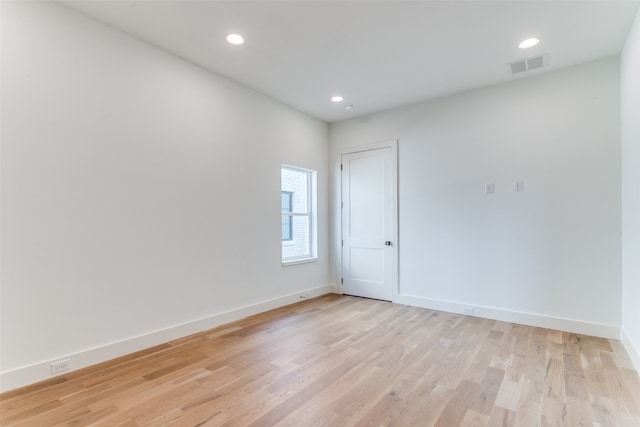 empty room featuring light hardwood / wood-style floors