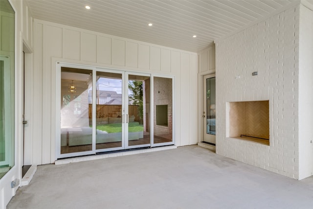 unfurnished living room featuring wood ceiling