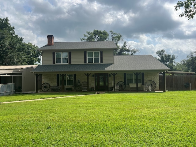 front of property featuring a front lawn