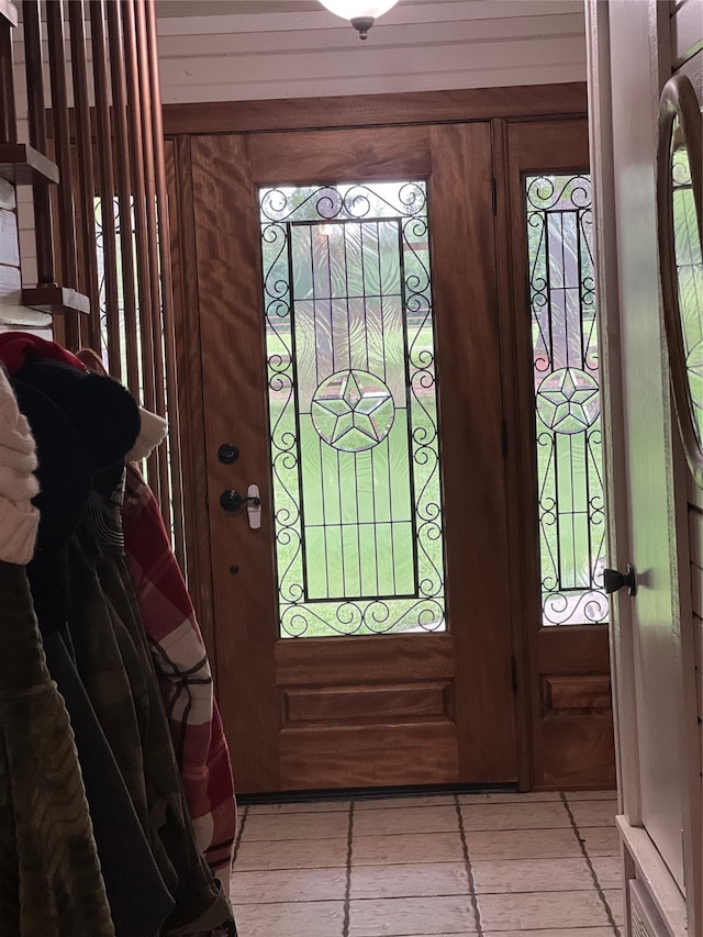 interior space with a wealth of natural light and hardwood / wood-style flooring