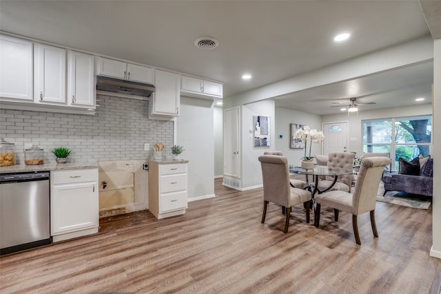 dining space featuring ceiling fan and light wood-type flooring