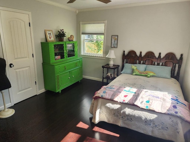 bedroom with dark wood-type flooring and ornamental molding